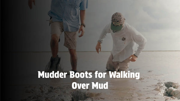 Two people using Mudder Boots to walk through deep